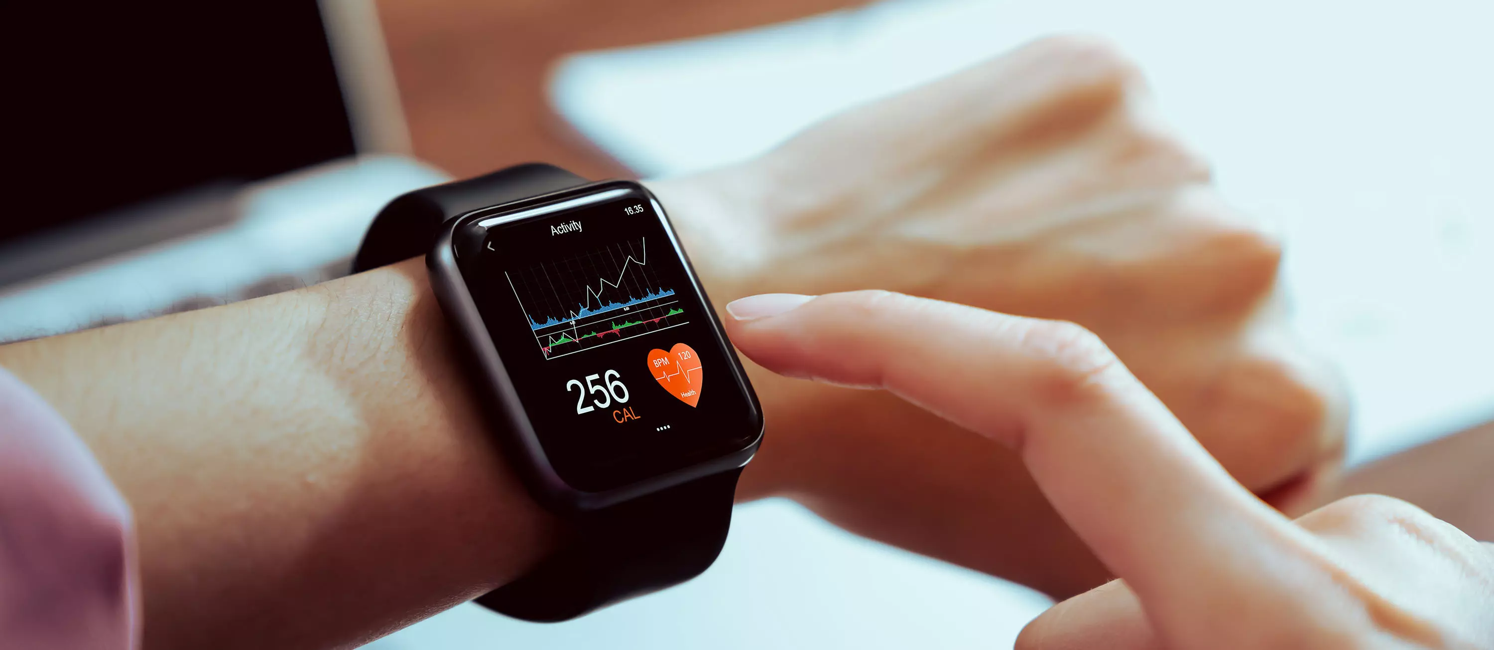 Close up of hand touching smartwatch with health app on the screen, gadget for fitness active lifestyle. Close up of hand touching smartwatch with health app on the screen, gadget for fitness active lifestyle.