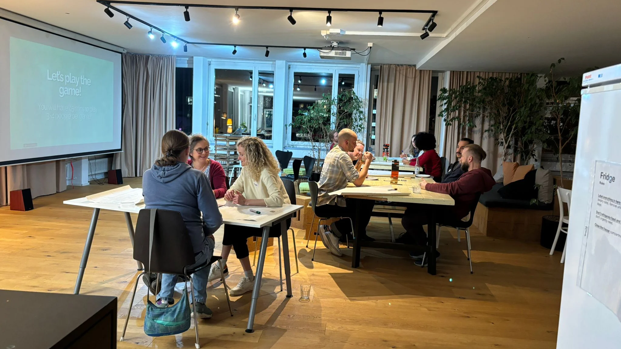 Workshop to gather feedback with several groups discussing and playing the game. 
