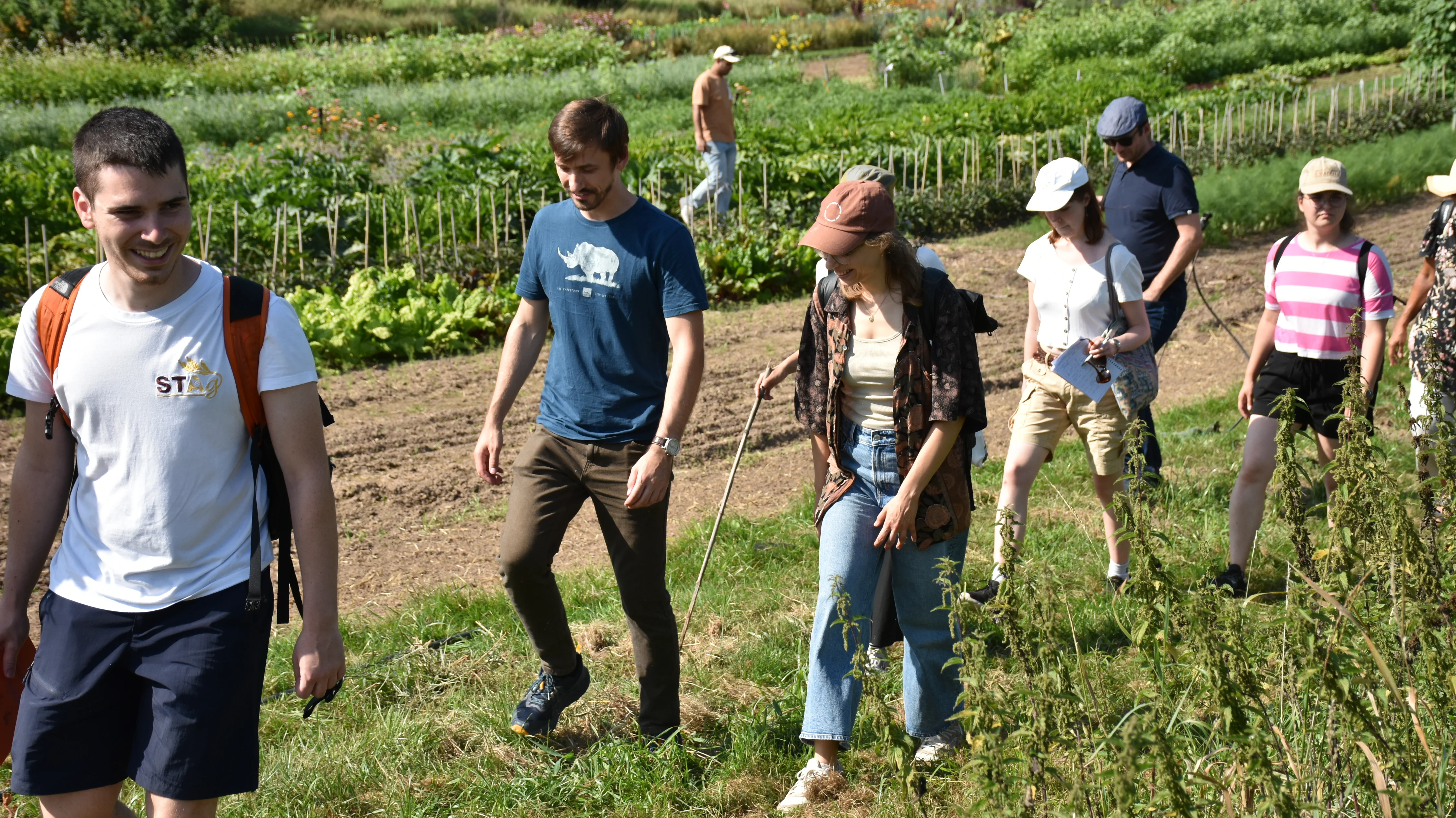 The pictures show the participants of the Summer School during their visits of case studies