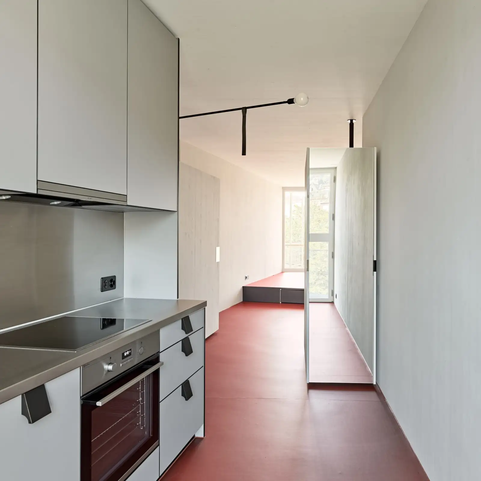 Performative Einzimmerwohnung mit räumlicher Komplexität